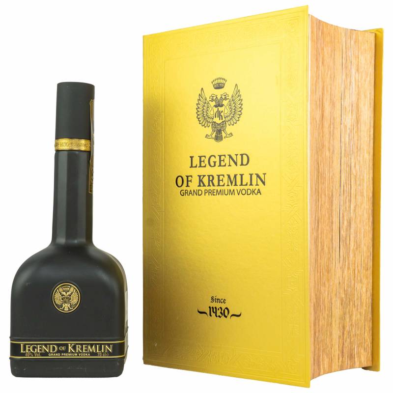 Black vodka bottle with a gold emblem and label, accompanied by a gold book-shaped box featuring embossed details, showcasing "Legend of Kremlin" and "Grand Premium Vodka."