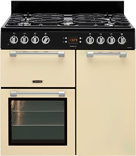 Cream-colored Leisure CK90F232C 90cm wide dual fuel range cooker featuring a black gas hob with five burners, stainless steel knobs, and two oven compartments with glass doors.