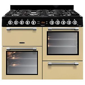 Leisure Cookmaster gas range cooker in cream, 100cm wide, featuring a black control panel, stainless steel knobs, and two glass-fronted ovens with chrome handles.