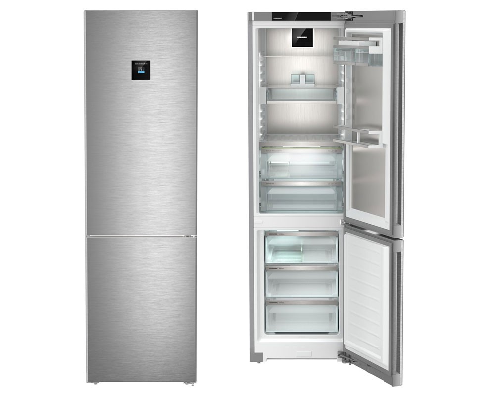Stainless steel Liebherr Peak CBNSTB579I fridge freezer with BioFresh technology, featuring a sleek design, No Frost capability, and illuminated interior compartments.