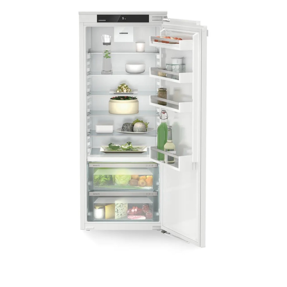 Fully integrated white Liebherr Plus IRBC4520 Bio Fresh larder fridge with multiple shelves, clear storage bins, and BioFresh technology for optimal food preservation.