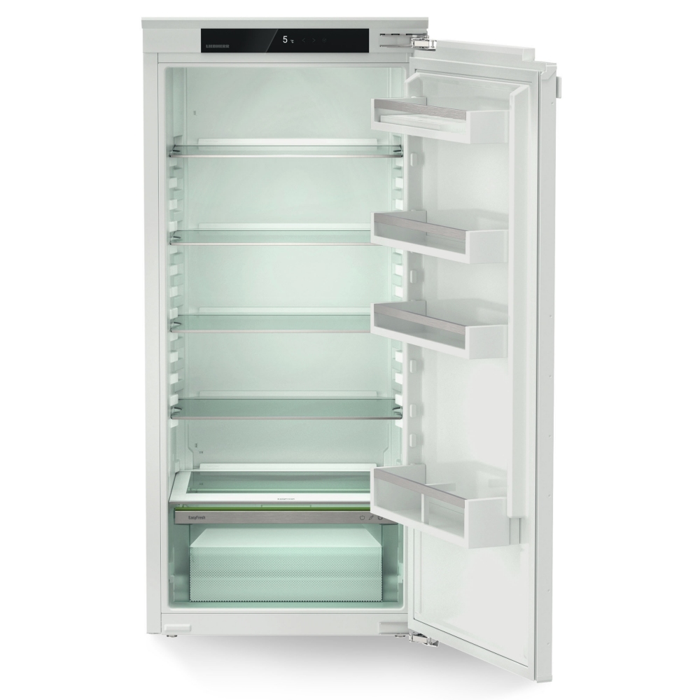 Liebherr IRE4100 EasyFresh refrigerator in white, featuring a spacious interior with adjustable glass shelves, a transparent vegetable drawer, and a digital control panel.