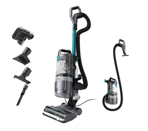 Corded upright vacuum cleaner in graphite teal with a transparent dust container, flexible hose, and multiple attachments for pet hair removal and detailed cleaning.