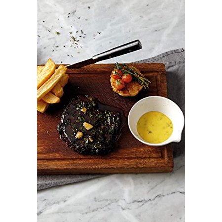 Set of three white ceramic dip bowls with spouts, featuring a sleek design, displayed alongside a grilled steak, roasted tomatoes, and crispy fries on a wooden board.