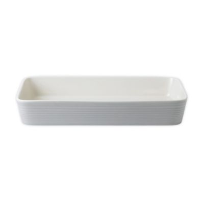 Rectangular baker in light gray, featuring a smooth ceramic surface with subtle ribbed detailing along the sides, measuring 16 inches in length.