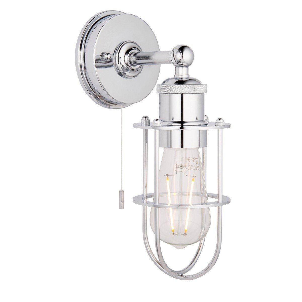 Chrome-plated metal wall lamp with a cylindrical glass shade, protective cage, and pull chain, designed for bathroom use with an IP44 rating.
