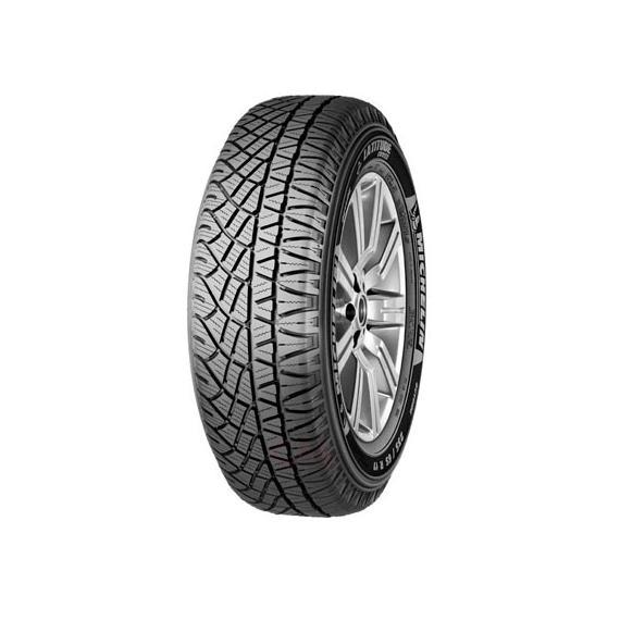 Michelin Latitude Cross tire in size 215/70 R16 104H XL, featuring a rugged tread pattern for enhanced grip, with a black rubber surface and white Michelin branding on the sidewall.