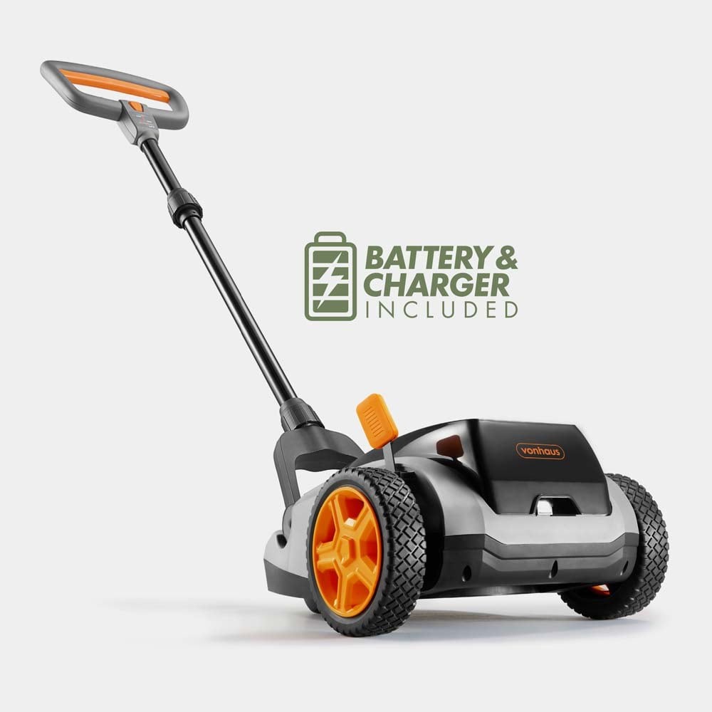 Mini cordless lawn mower in black and orange, featuring a sleek design, durable plastic body, and prominent wheels, with a battery and charger included graphic.