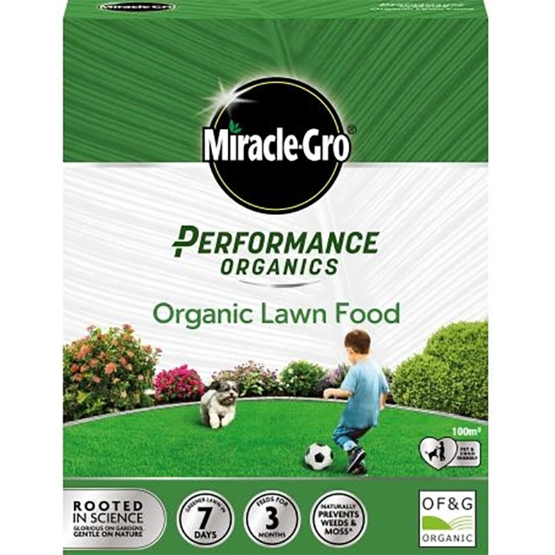 Green and white box of Miracle-Gro Performance Organics Lawn Food, featuring a child and a dog on the front, with text highlighting its organic nature and coverage area of 100m².