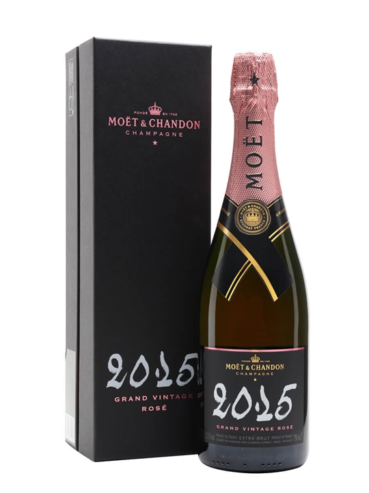 Moët & Chandon Grand Vintage Rosé 2015 in a sleek black gift box, featuring a pink foil cap, gold accents, and a prominent 2015 label on the bottle.