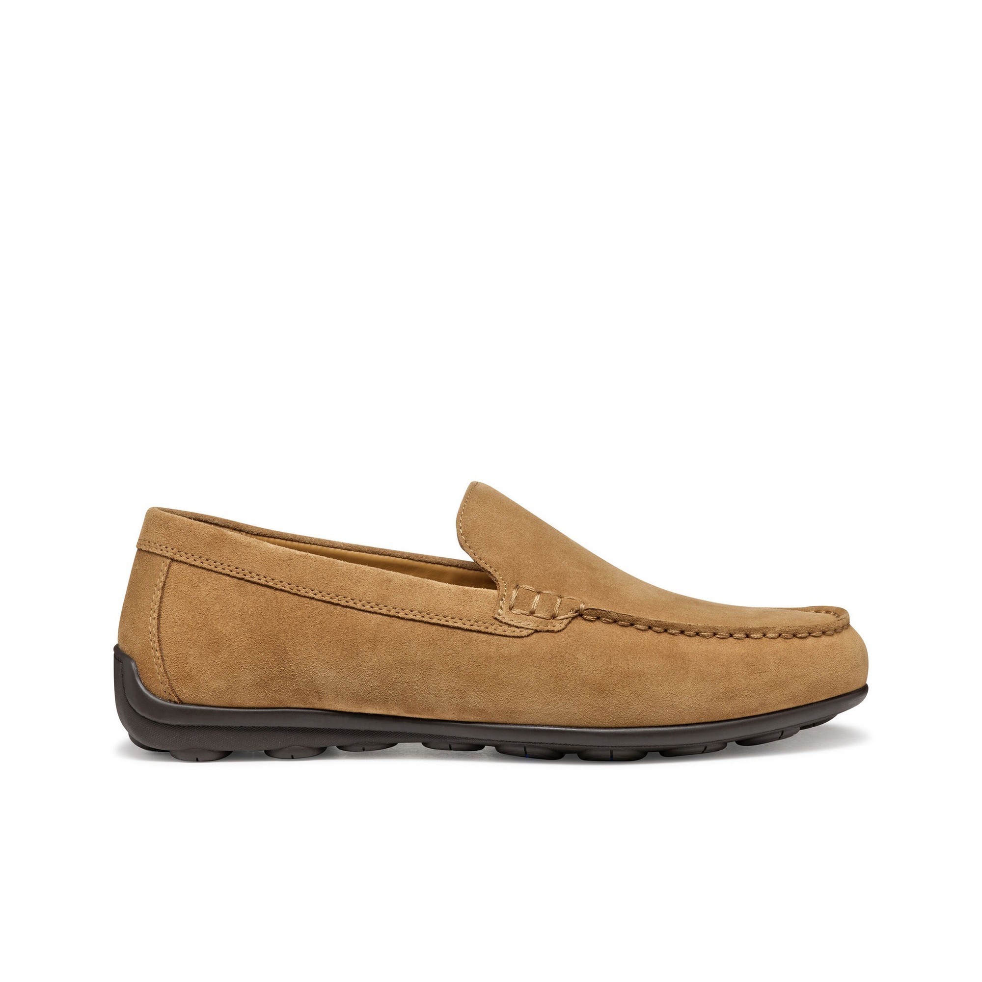 Tan suede moccasins with a slip-on design, featuring decorative stitching and a flexible rubber sole for comfort.