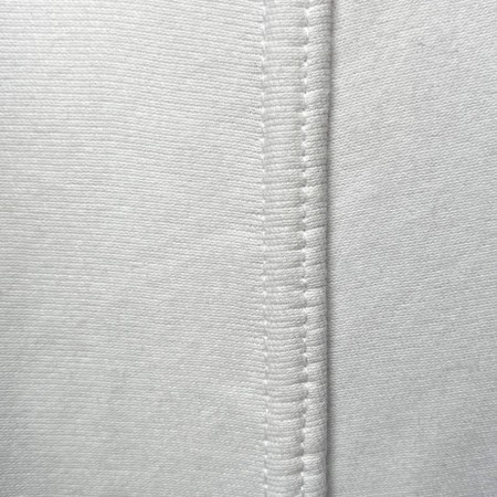 White fitted sheet for a Moses basket, made from soft material, featuring neat stitching and designed to fit 30x74cm baskets, sold in a pack of two.