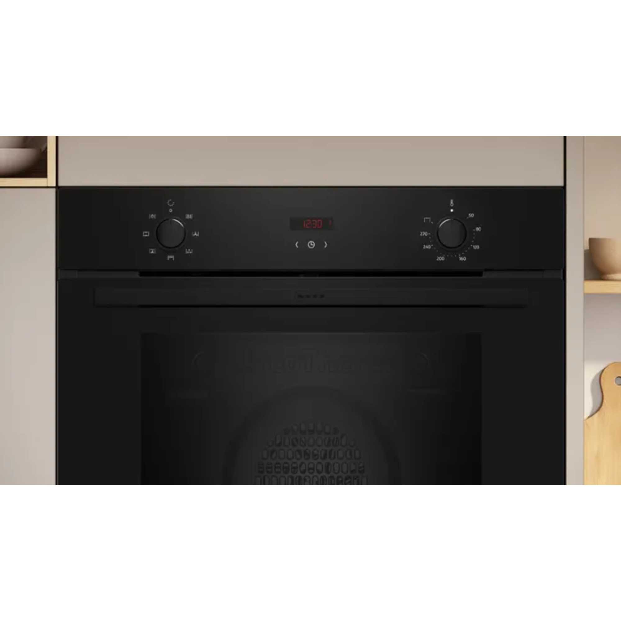 Black NEFF N30 B1DCC0AK3B electric single oven with a sleek design, featuring a digital display, control knobs, and a minimalist front panel.
