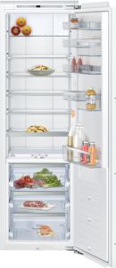 High integrated upright fridge in white, 177cm tall and 56cm wide, featuring glass shelves, a transparent vegetable drawer, and a variety of food items including fruits and condiments.