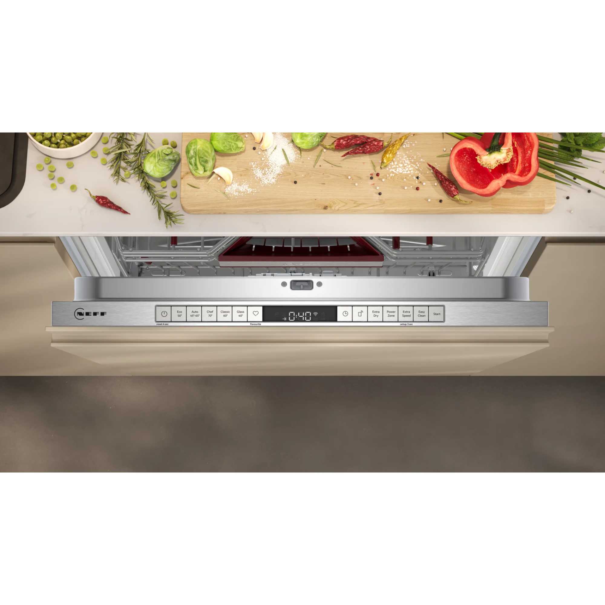 Fully integrated NEFF S155ECX07G dishwasher with a sleek stainless steel front, digital control panel, and 14 place settings, designed for seamless kitchen integration.