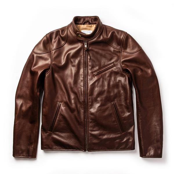 Band collar moto jacket in rich espresso steerhide, featuring a zip front, side pockets, and a sleek, fitted design with minimal stitching details.