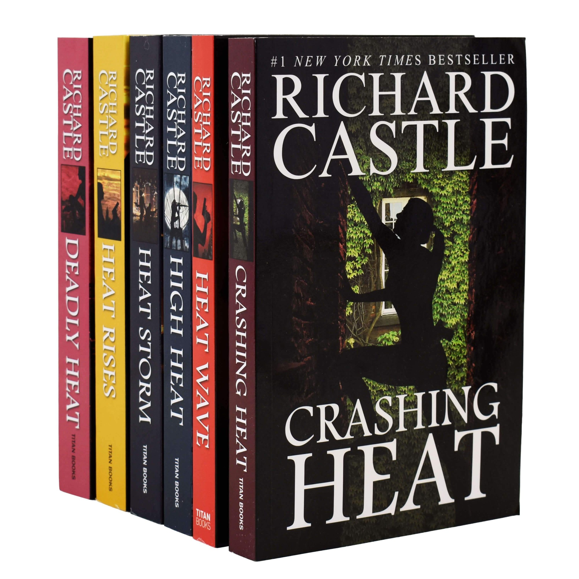 Six paperback books from the Nikki Heat series by Richard Castle, featuring vibrant colored spines and the title "Crashing Heat" prominently displayed on the front cover.