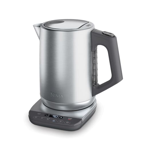 Stainless steel kettle with a sleek design, featuring a digital control panel, a 1.7L capacity, and a black handle for easy pouring.