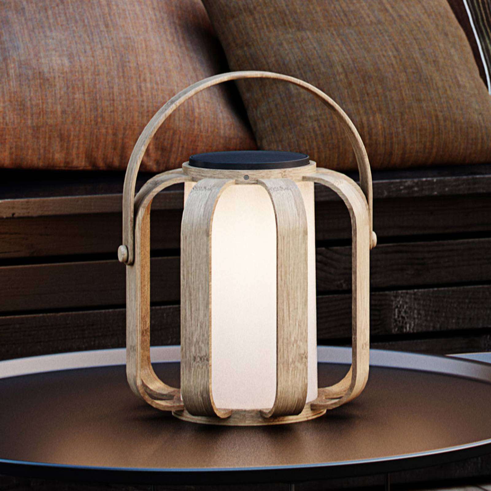 Nordlux Bob Battery Solar Light features a natural wood frame with a soft white glass center, a handle for portability, and a sleek, modern design suitable for outdoor settings.