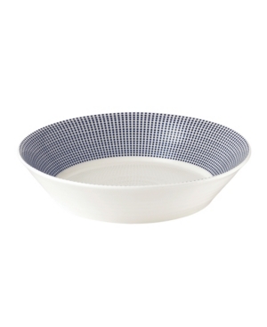 White ceramic pasta bowl featuring a deep blue dotted pattern around the rim, with a smooth interior and slightly flared edges for an elegant touch.