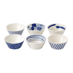 Set of six ceramic tapas bowls in varying blue patterns, featuring stripes, dots, and abstract designs on a white background, showcasing a modern and stylish aesthetic.