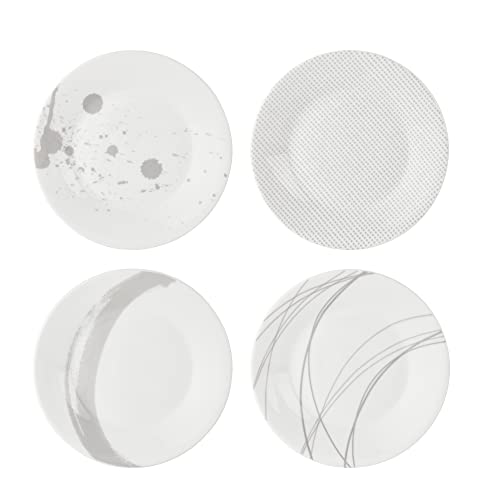 Set of four small plates in white porcelain, featuring unique designs: splatter, textured pattern, curved gray line, and delicate gray lines, showcasing elegant and modern aesthetics.