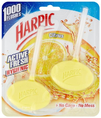 Harpic Hygienic Toilet Rim Block Twin Pack featuring two yellow citrus-scented blocks in a clear plastic packaging with a splash design and the Harpic logo prominently displayed.