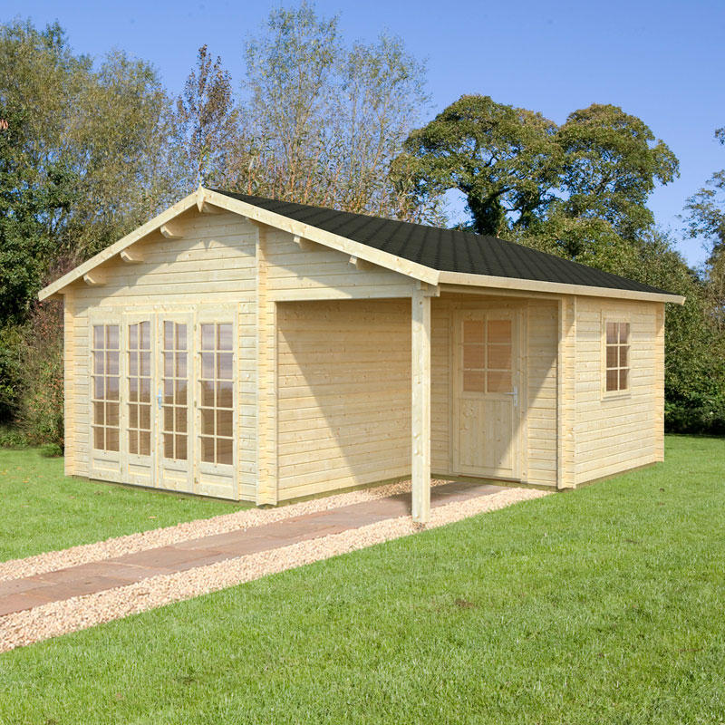 Light-colored wooden log cabin with a sloped black roof, featuring large front windows and a side door, set on a grassy area with a stone pathway leading to it.