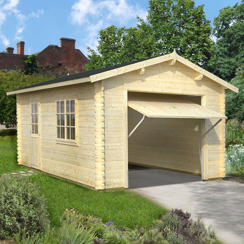 Light-colored wooden log cabin garage with a sloped roof, featuring an up-and-over door, two windows, and a natural setting with greenery and a clear blue sky.