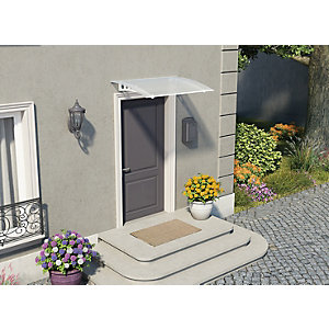 White twinwall door canopy with a curved design, made of durable polycarbonate, mounted above a dark door, complemented by potted flowers and a welcome mat on stone steps.