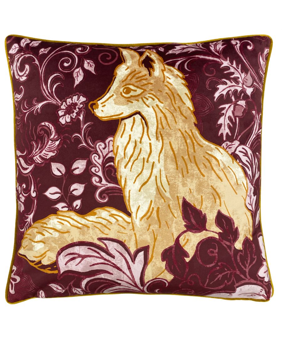 Magenta velvet cushion featuring a gold fox design surrounded by intricate floral patterns, with contrasting piped edges, measuring 50cm x 50cm.