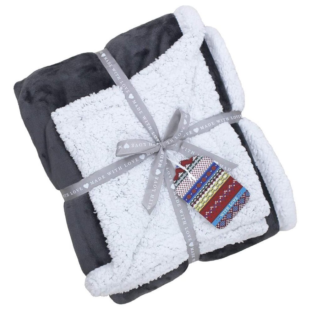 Charcoal-colored Riva Home Lux Sherpa fleece blanket, measuring 127x152 cm, featuring a soft, plush texture, neatly tied with a ribbon and a decorative tag.