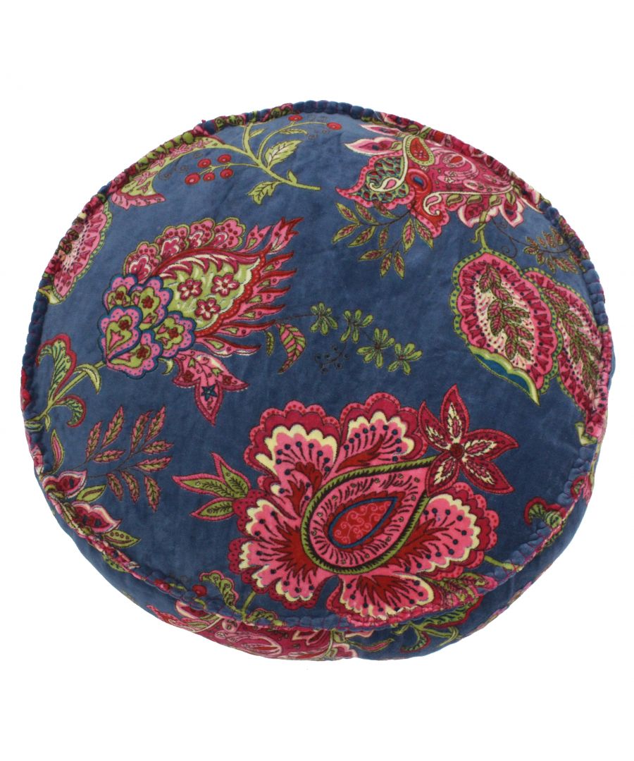 Round cushion in smoke blue cotton featuring vibrant floral patterns in pink, red, and green, with a textured finish and piped edges.