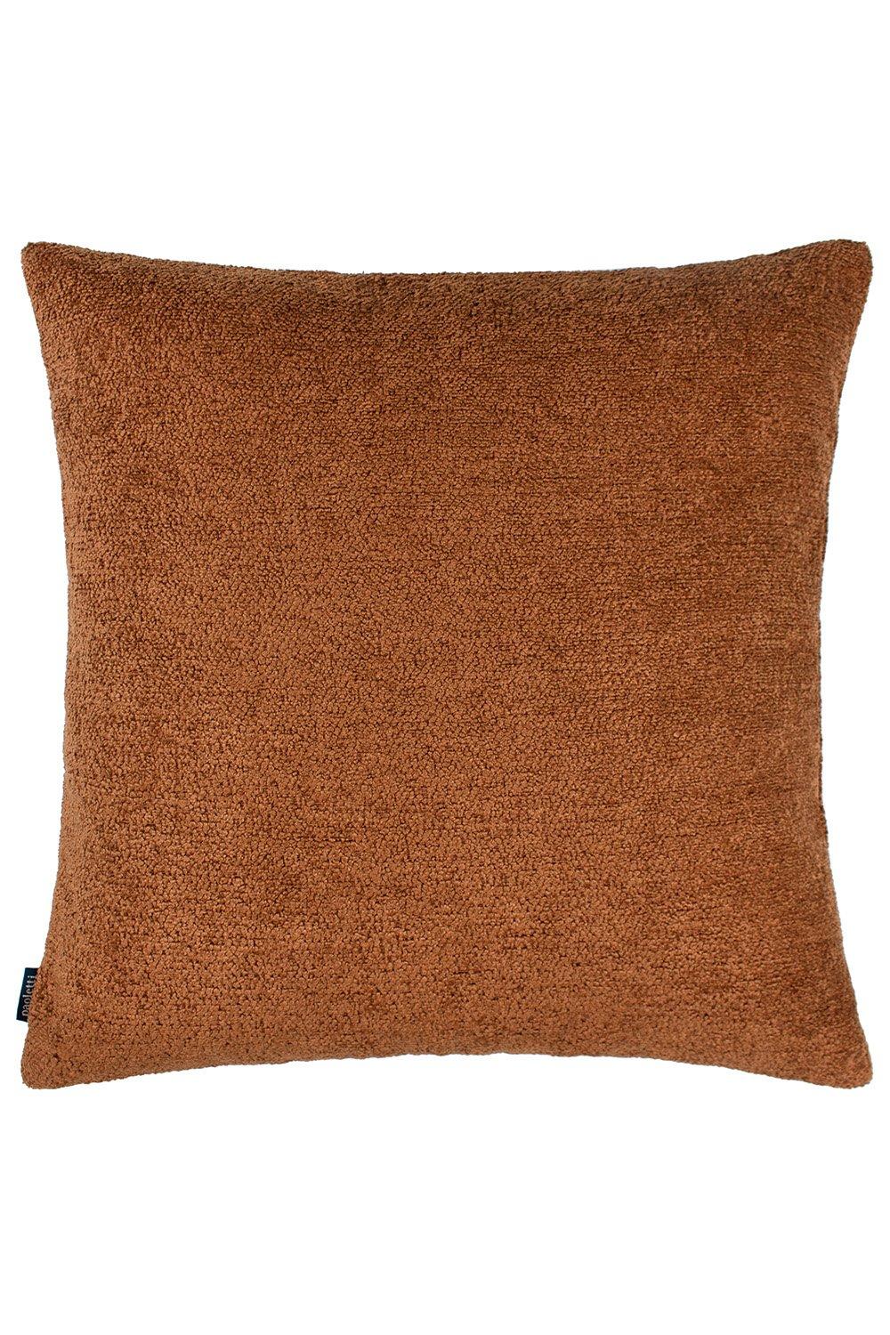 Rust-colored boucle cushion with a soft texture, featuring a square shape and measuring 60 cm x 60 cm, designed for reversible use.