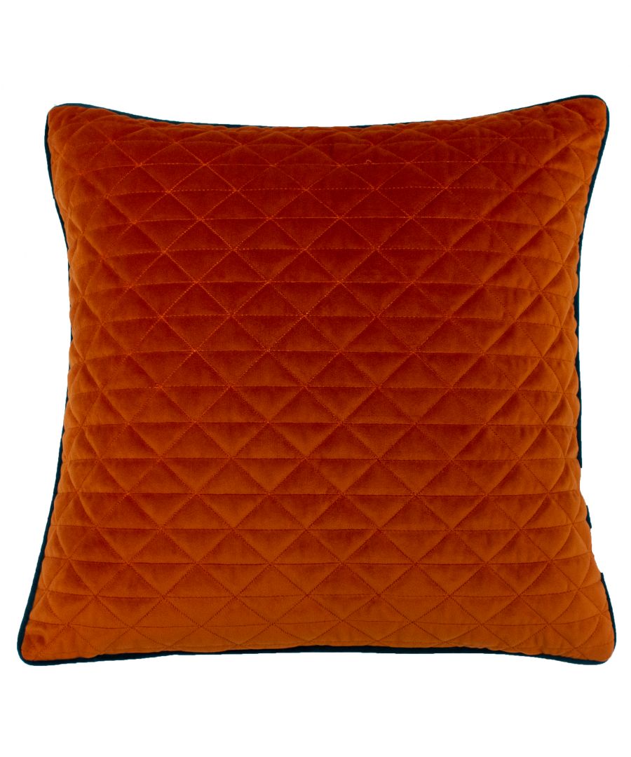 Orange quilted cushion featuring a geometric pattern, made of soft velvet, with a contrasting dark trim, measuring 45cm x 45cm.