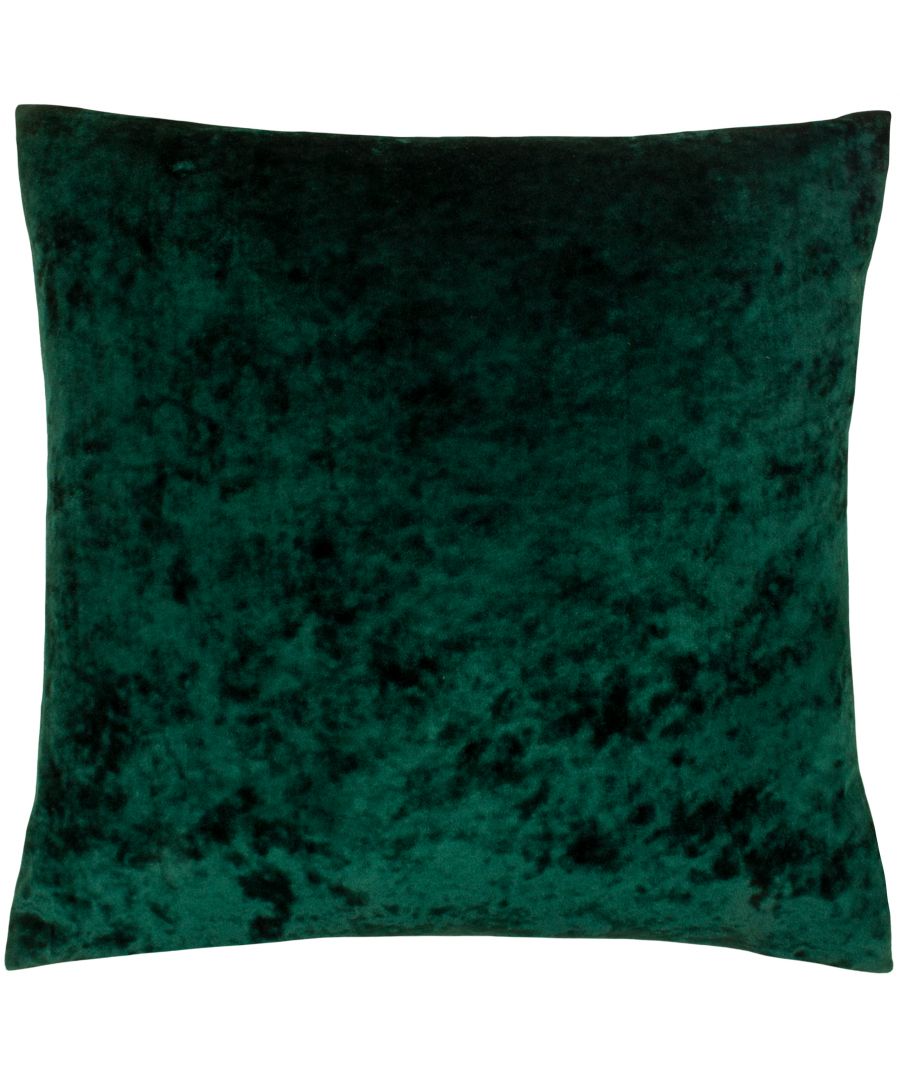 Emerald green velvet cushion measuring 55 cm x 55 cm, featuring a soft, textured surface with a rich, deep color and a square shape.