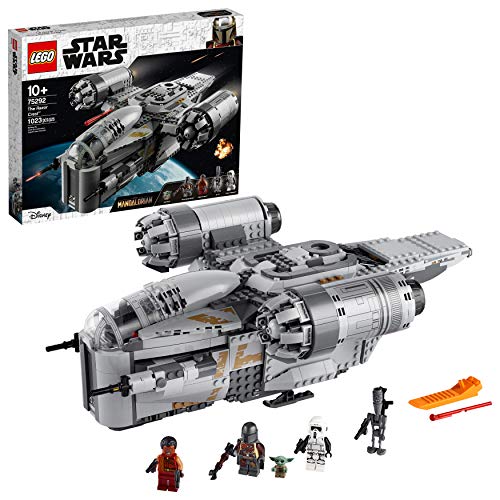 LEGO Star Wars Razor Crest building kit featuring a detailed gray spaceship with two engines, accompanied by four mini-figures and accessories, set against a colorful box design.