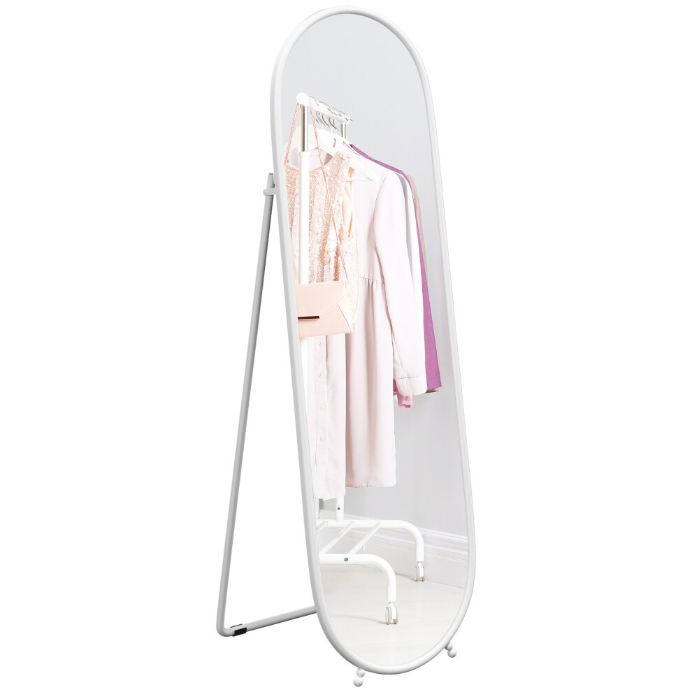 Full-length white mirror with a sleek, oval design, featuring a sturdy metal frame and a leaning or free-standing option, reflecting clothing on a rack behind it.