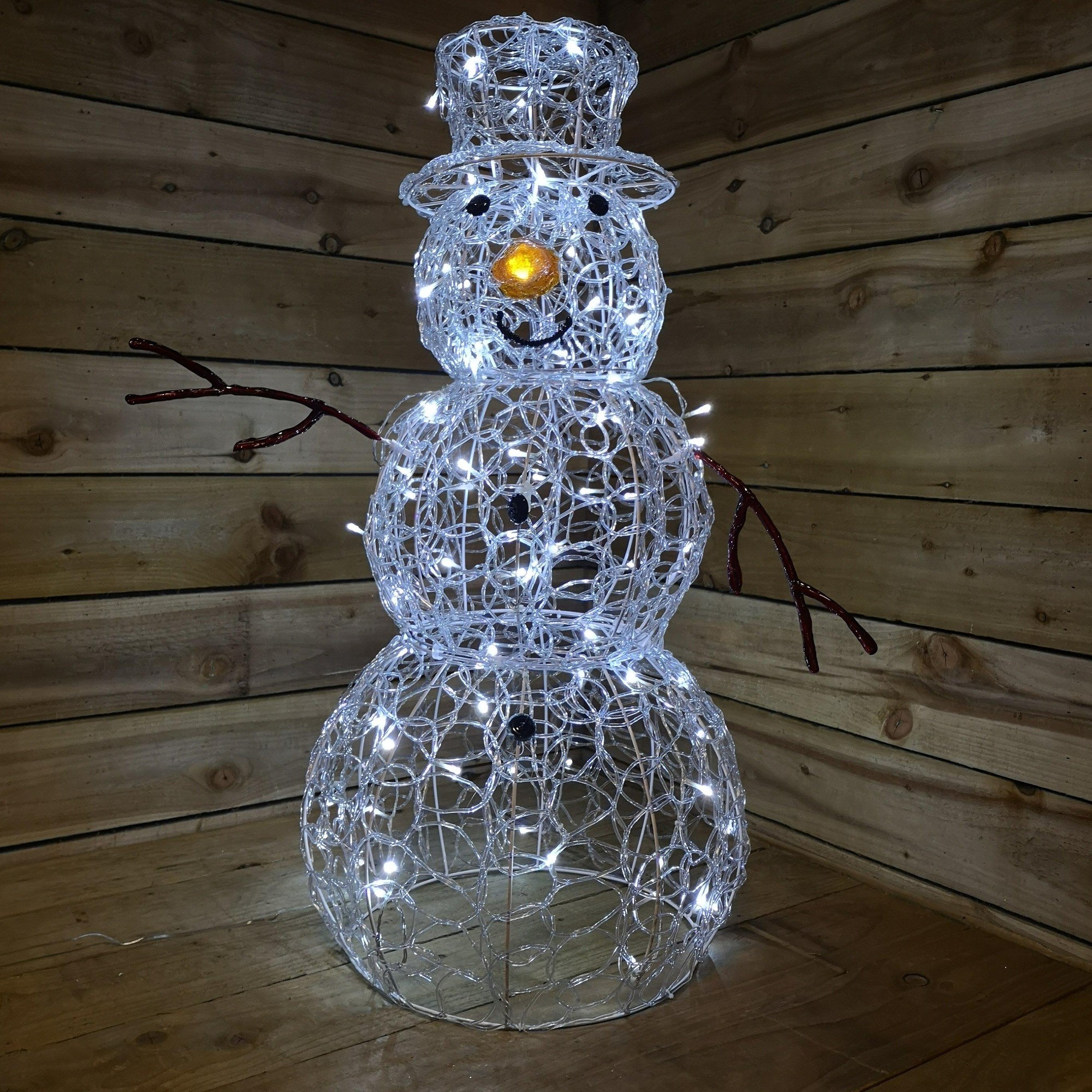 90cm tall soft acrylic snowman with a lit design, featuring 80 white LEDs, a carrot nose, and a top hat, set against a rustic wooden background.