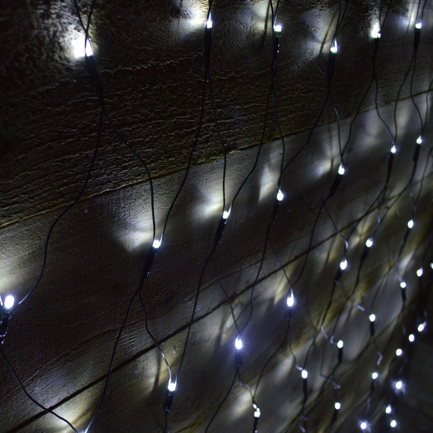 360 LED multi-action Christmas net light in cool white and white, featuring a flexible black wire design, ideal for window decoration.