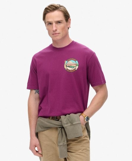Purple and magenta short-sleeve T-shirt featuring a colorful postcard chest print, made of soft cotton, styled with a relaxed fit and round neckline.