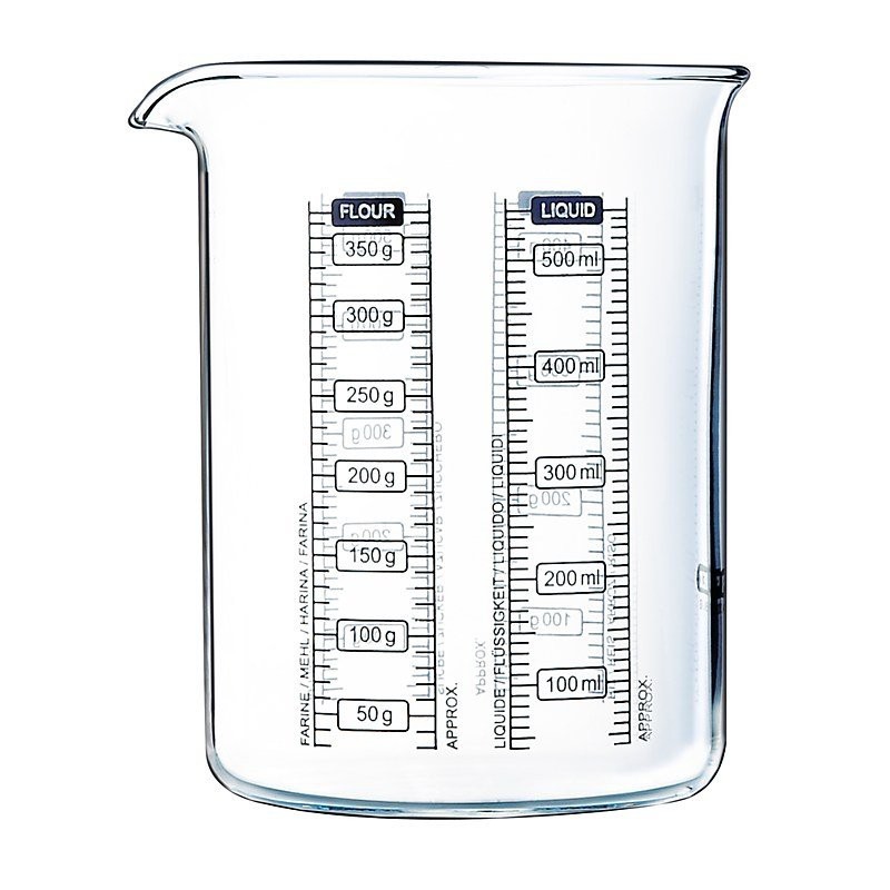 Clear glass measuring beaker with a 0.50L capacity, featuring measurement markings for flour and liquid in grams and milliliters on opposite sides.