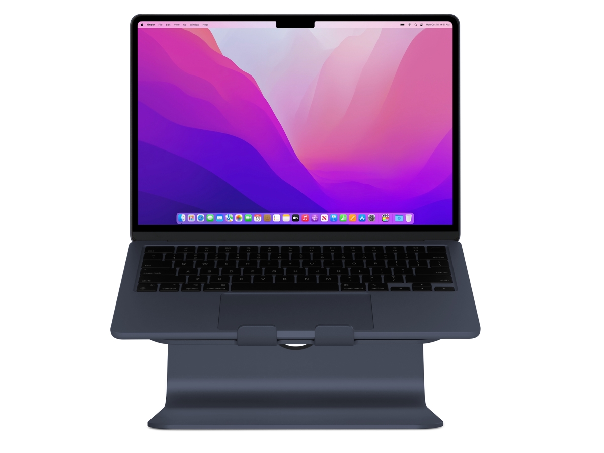 MStand Laptop Stand in Midnight color features a sleek aluminum design with a sturdy base, elevating a laptop for improved ergonomics and ventilation.