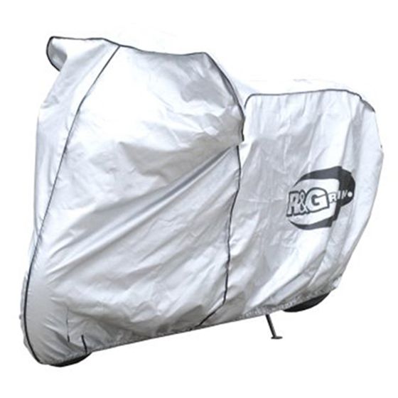 Silver outdoor motorcycle cover by R&G Racing, made from durable material with a fitted design, featuring the R&G logo prominently on the side.