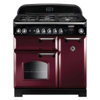 Classic 90cm Rangemaster dual fuel range cooker in cranberry red, featuring a black enamel top, five gas burners, chrome control knobs, and two ovens with glass doors.