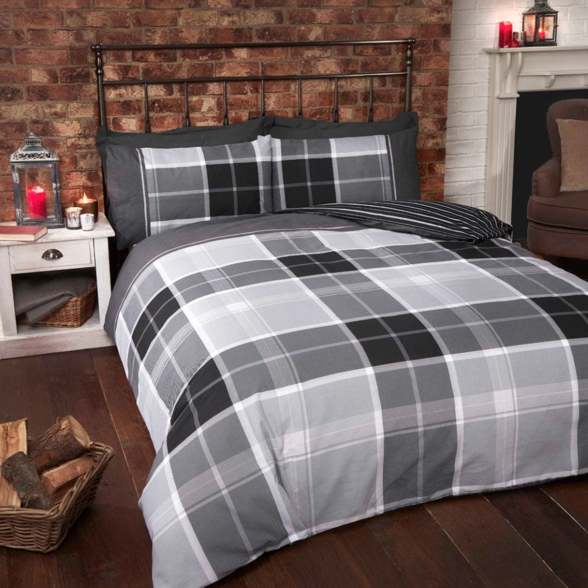 Double duvet set featuring a grey argyle pattern with contrasting stripes, made from soft fabric, complemented by matching pillowcases on a rustic wooden bed frame.