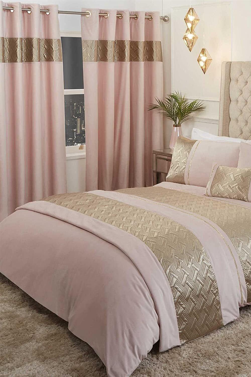 Soft pink polyester cushion with a textured gold pattern, measuring 50x30 cm, complements a stylish boudoir setting with matching bedding and curtains.