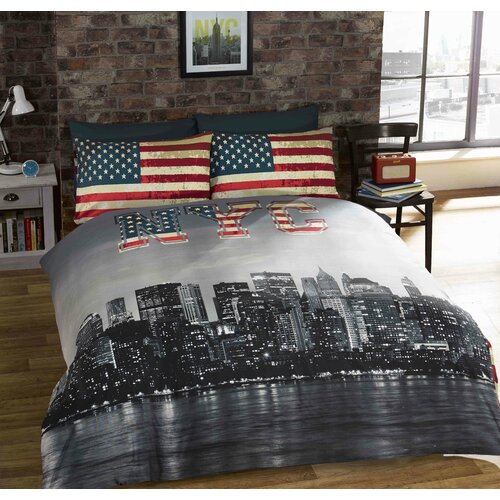 Reversible duvet set featuring a photographic print of NYC skyline, with "NYC" in bold letters, complemented by American flag-patterned pillowcases on a dark background.