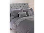 Grey king-size duvet set featuring ruffle rose embellishments, complemented by matching pillowcases and a decorative cushion, all set against a tufted grey headboard.