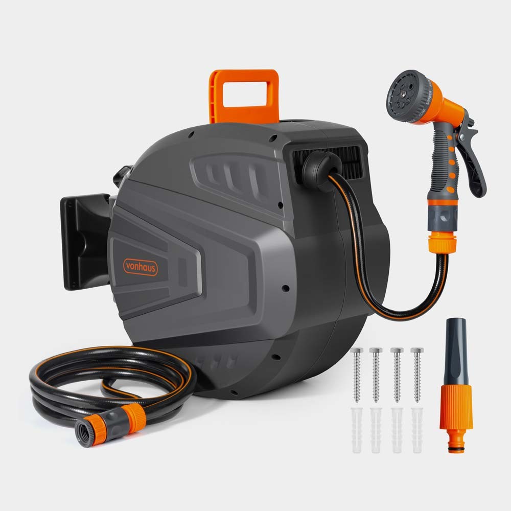 Retractable garden hose reel in black and orange, featuring a 40m hose, a spray nozzle, and mounting accessories for easy installation.